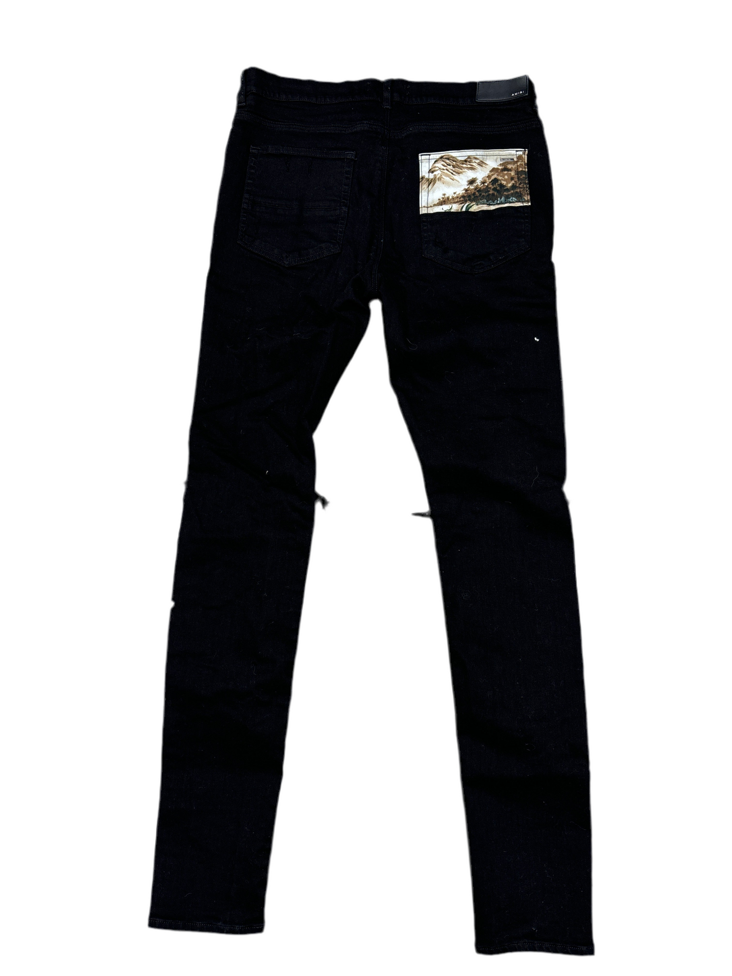 Amiri Patchwork Distressed
Skinny Jeans