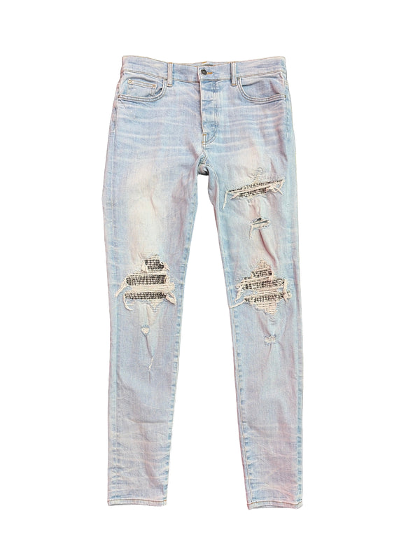 Amiri MX1 Black Acid Wash Patch Jeans Light Indigo