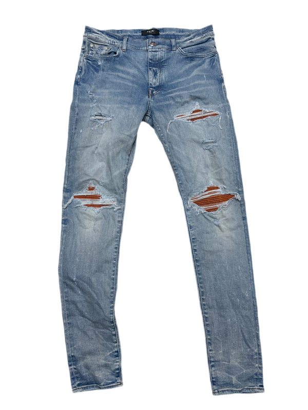 Amiri MX 1 Orange Patch Denim Jeans