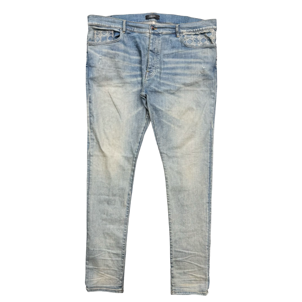 Amiri Monogram Debossed Jeans Blue