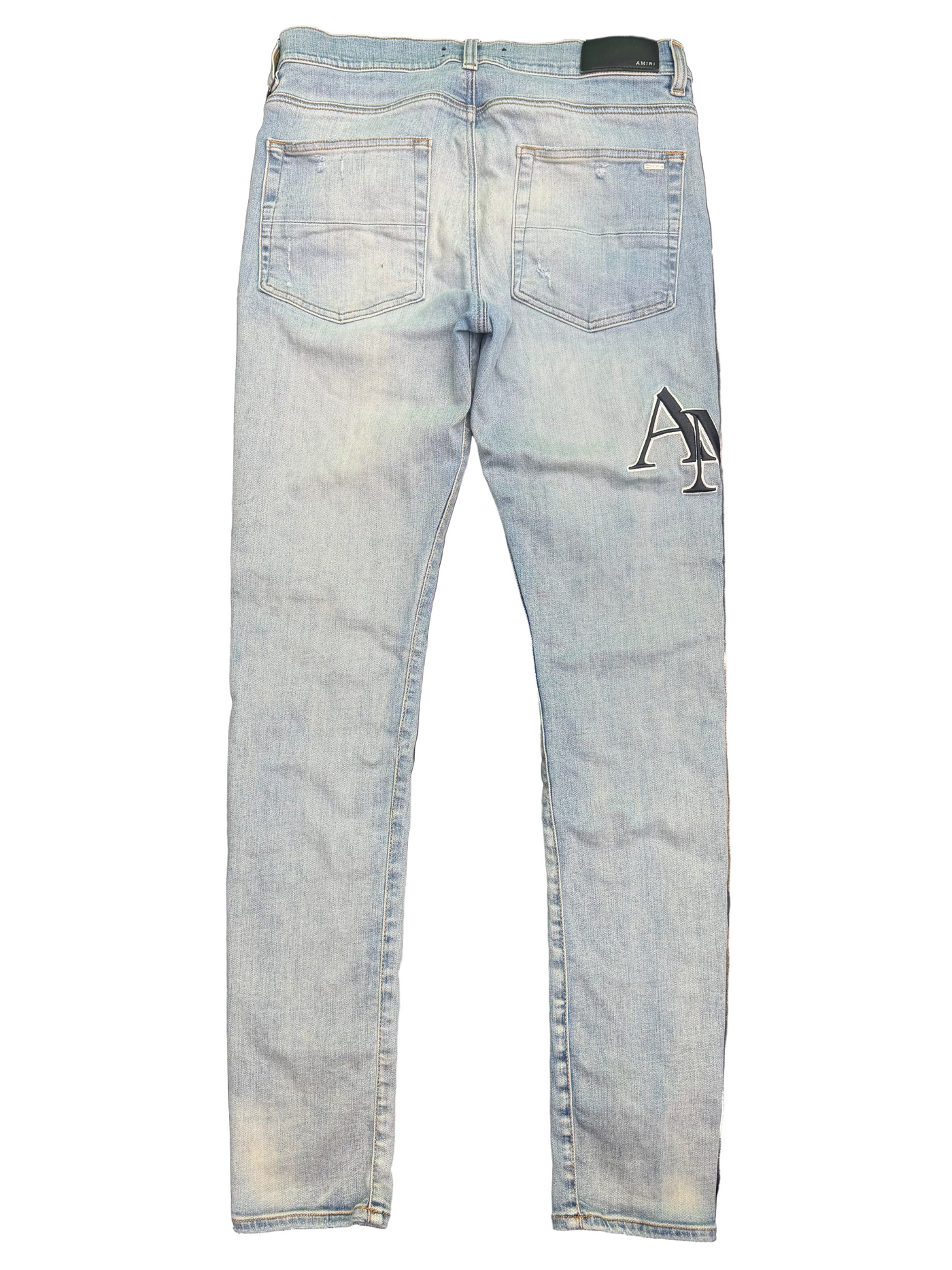 Amiri Staggered Logo Jeans Indigo Black