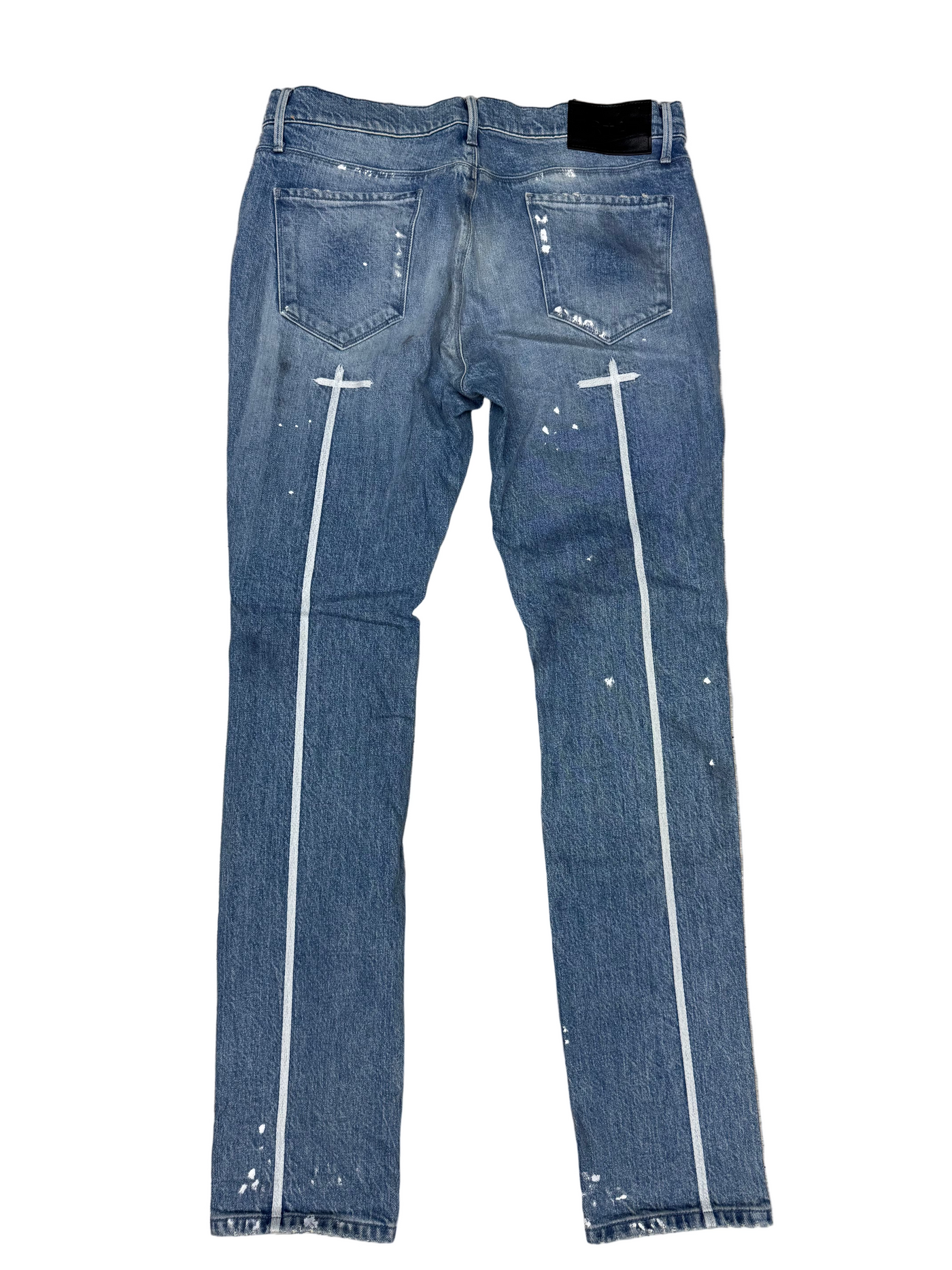 RTA Clayton Distressed White Paint Jeans
